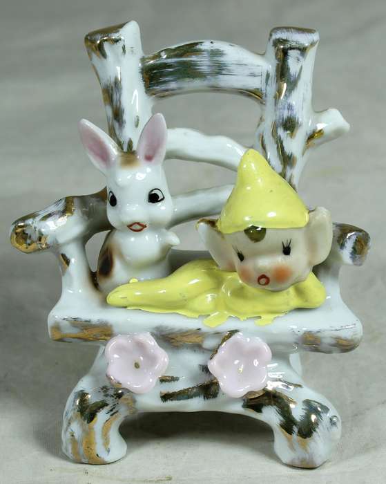 Pixie and rabbit on a chair