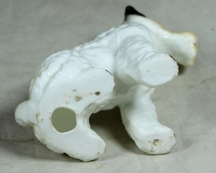 Small ceramic airdale dog