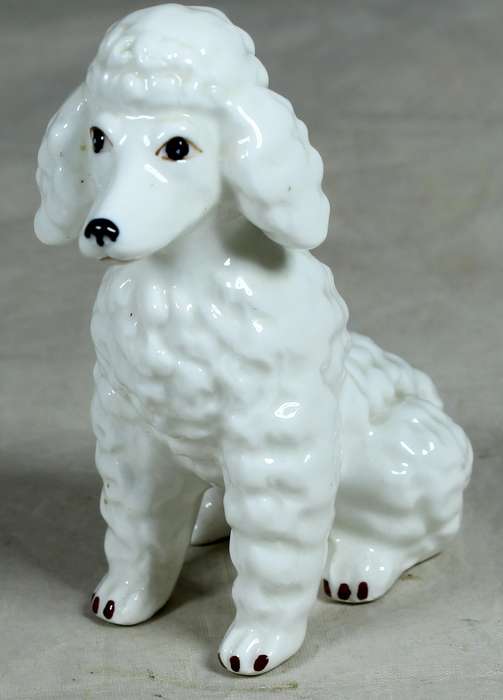 Ceramic seated poodle