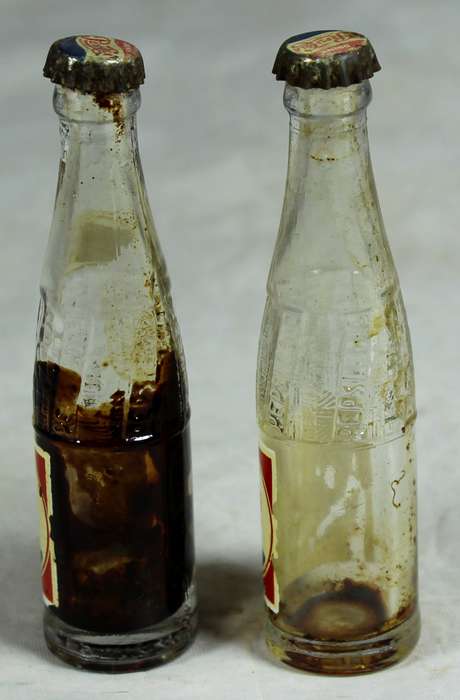 Pair of miniature Pepsi-Cola bottles