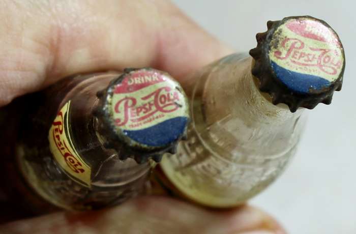 Pair of miniature Pepsi-Cola bottles