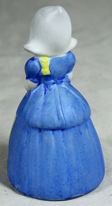 Ceramic bell Dutch girl in traditional clothes