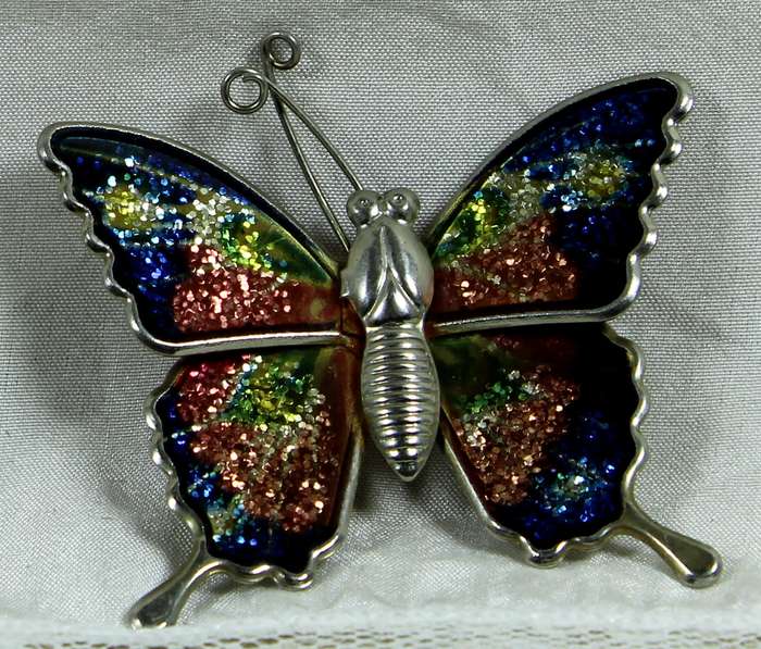 Butterfly metal broach