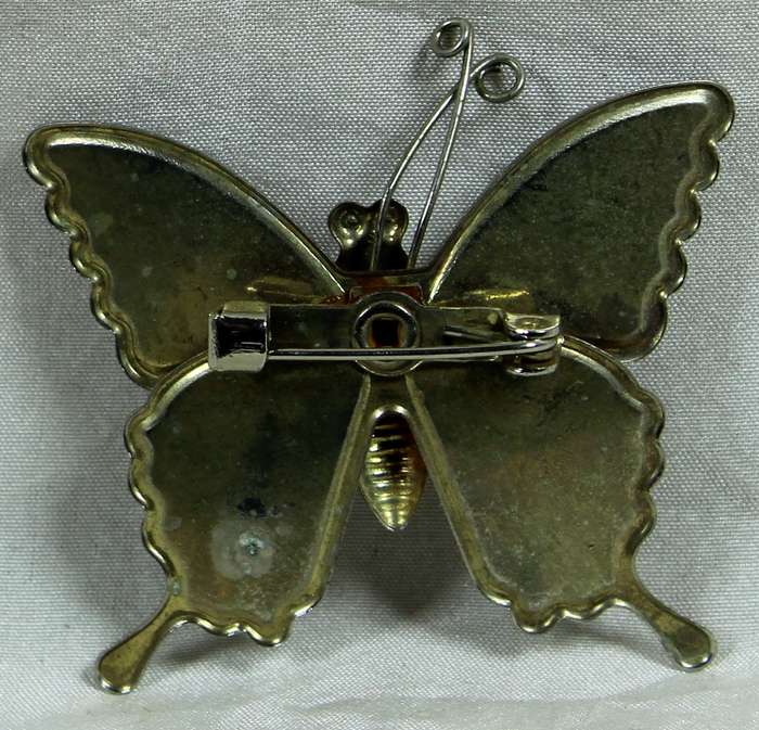 Butterfly metal broach