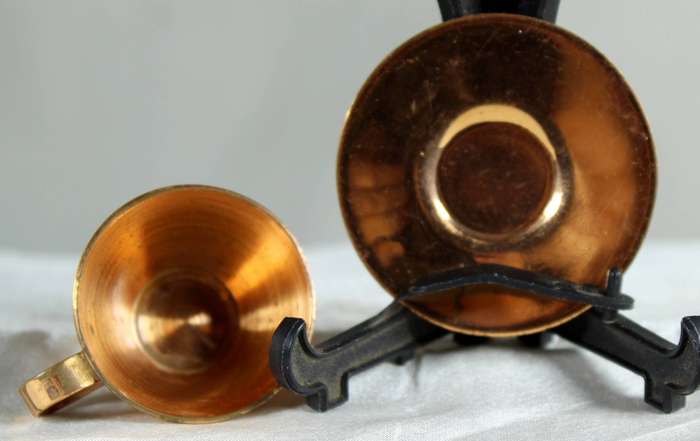 Miniature copper cup and saucer