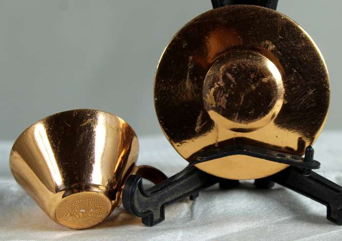 Miniature copper cup and saucer