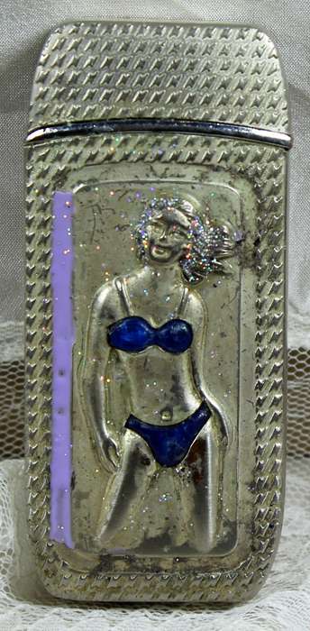 Vintage silver bikini lighter