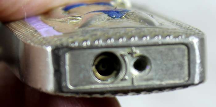 Vintage silver bikini lighter