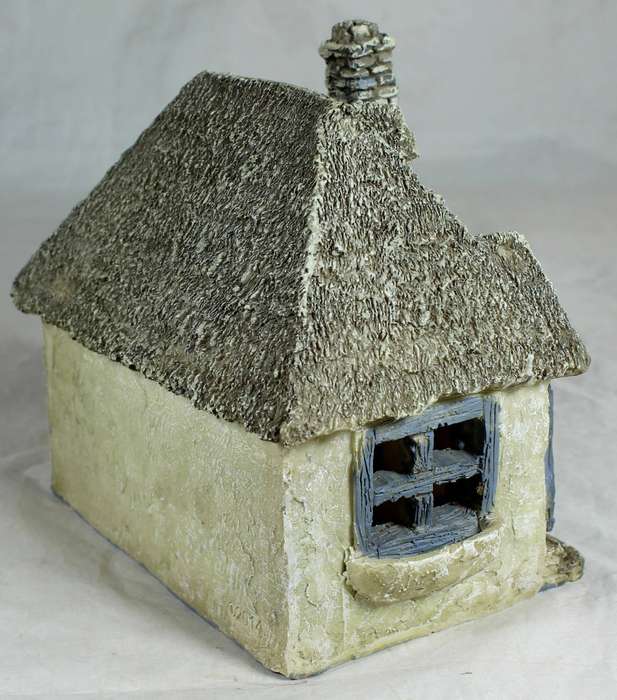 Large model of ancient cottage