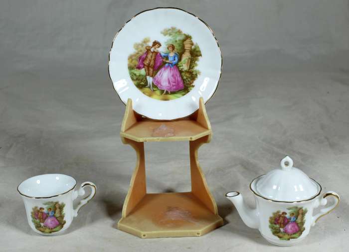 Miniature Japanese tea for one - on a stand with Victorian scene