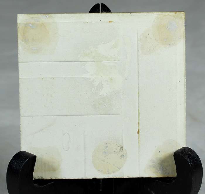 Small ceramic tile with windmill scene