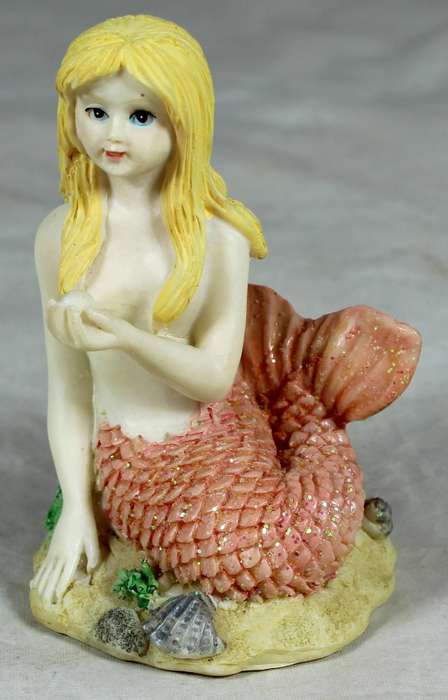 Resin mermaid in pink - seated holding a pearl