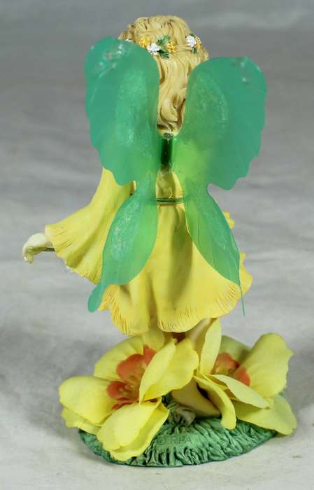 Fairy among large flowers