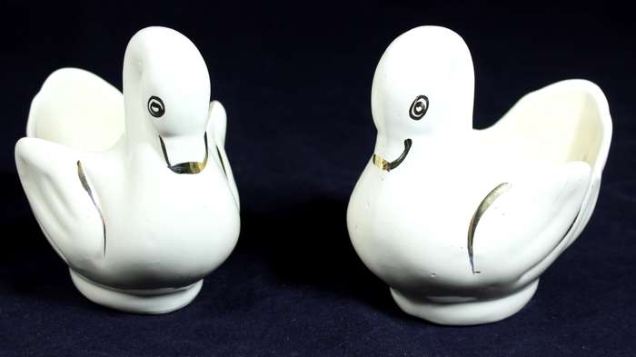 Pair of creme & gold swans