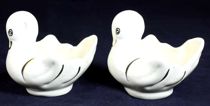 Pair of creme & gold swans