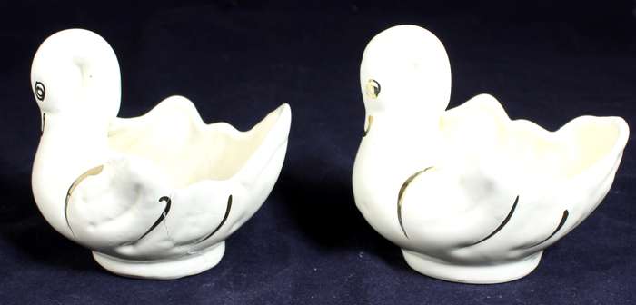 Pair of creme & gold swans