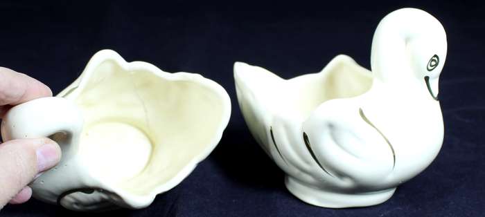Pair of creme & gold swans