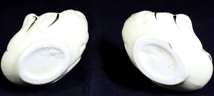 Pair of creme & gold swans