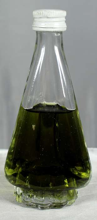 Mini liquor bottle - Triangular bottle with green liquid