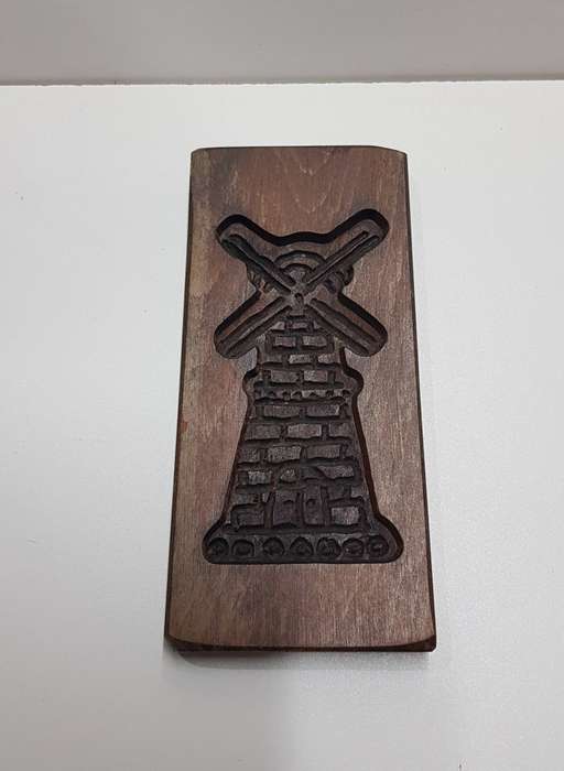 Vintage Dutch wooden cookie mould for speculaas. Small board with a traditional windmill design.