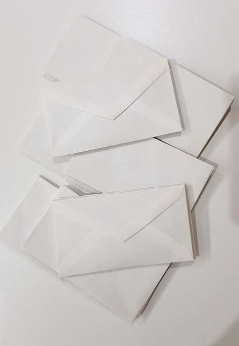 2x unlined novelty vintage writing/invitation pads. One pad unused with red hearts.....