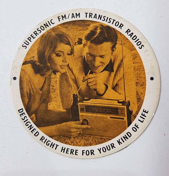 Vintage licence disc holder/ licence certificate holder advertising Supersonic FM/AM
