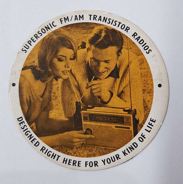 Vintage licence disc holder/ licence certificate holder advertising Supersonic FM/AM