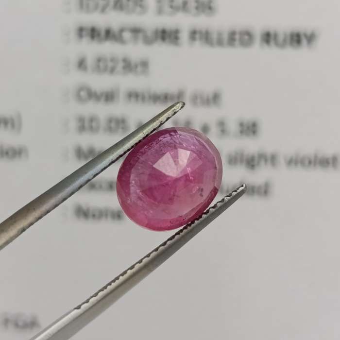 Fracture filled Ruby slight violet red Oval mixed cut 4.02 carat with Gemlab certificate