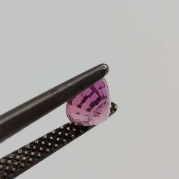 Natural slight violet pink sapphire oval mixed cut 0.81 carat with Gemlab certificate