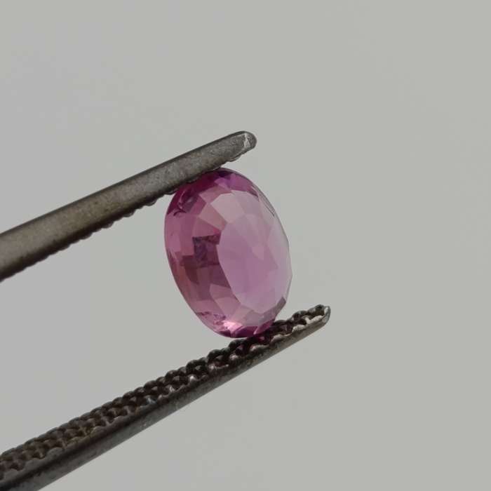Natural slight violet pink sapphire oval mixed cut 0.81 carat with Gemlab certificate