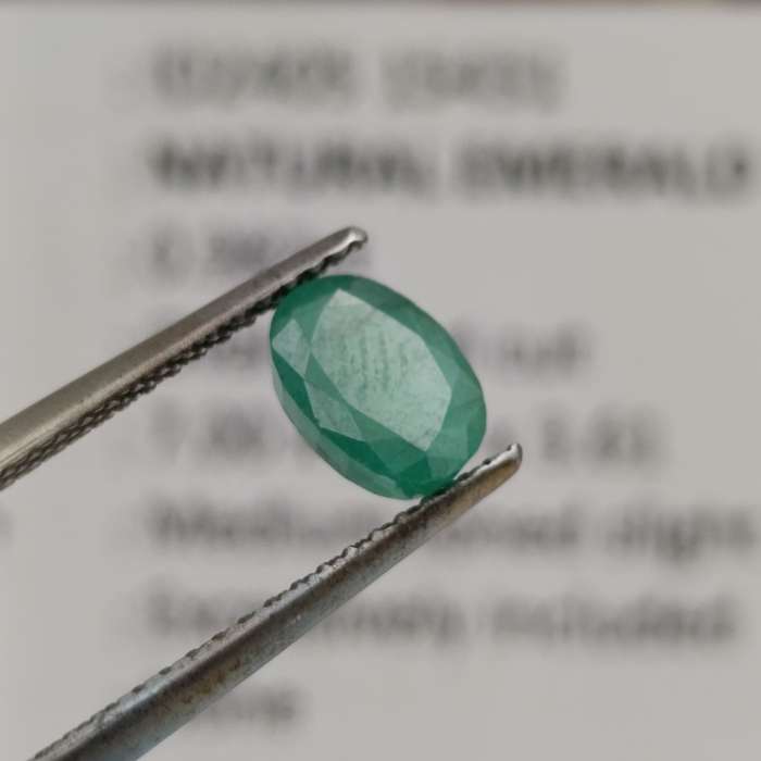 Natural Emerald of 0.98 carat oval mixed cut slight yellowish green with Gemlab certificate