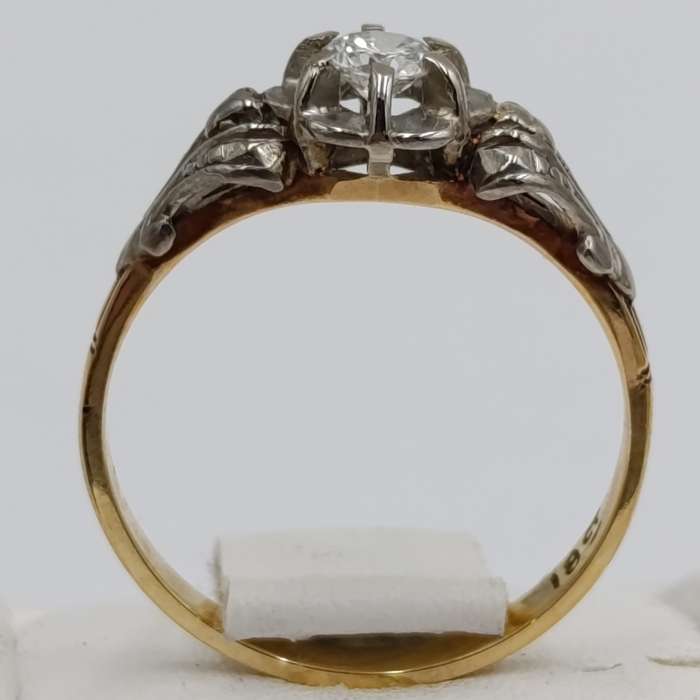 Antique 18kt white and yellow gold ring with a 20 plus pointer diamond