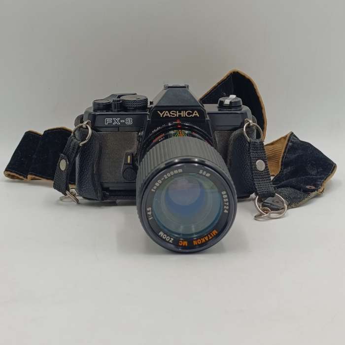 Vintage Yashica FX-3 35mm camera with Hanimex T21 flash in bag - shutter working