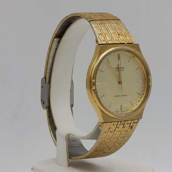 Orient Quartz Gold colour men's watch - working