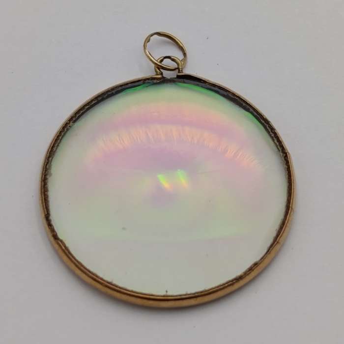 Vintage Hologram eye pendant with 9kt Gold surround