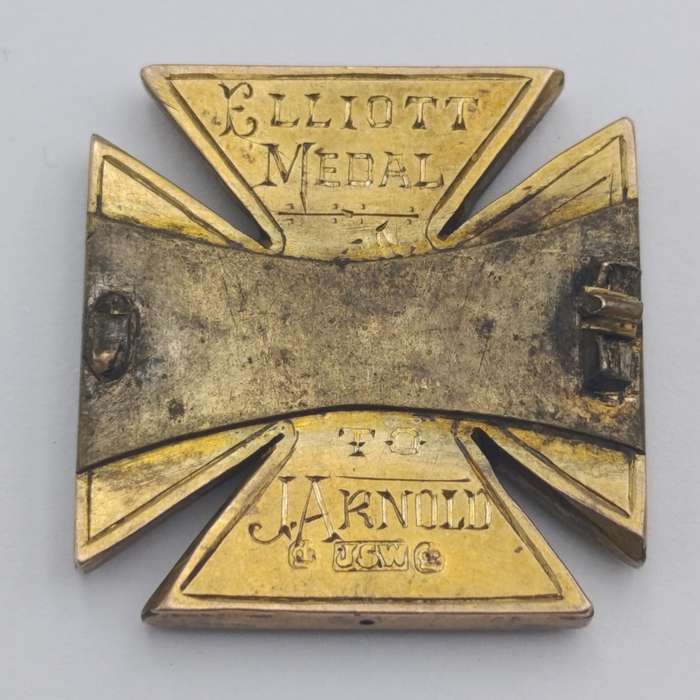 Brooch with Gold inscribed Elliott medal to J. Arnold "CAS 1895"