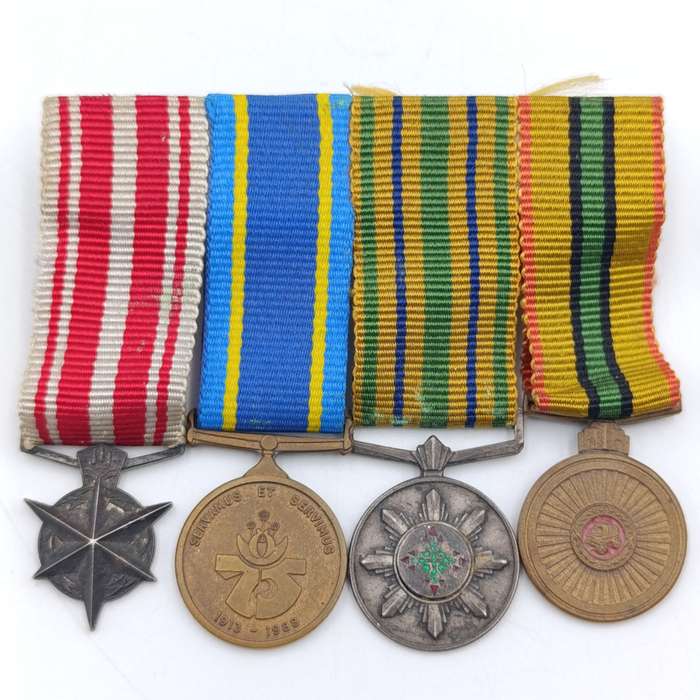 Set of 4 Police and Railway Police medals issued to Captain JJ van der Merwe - plus miniature set