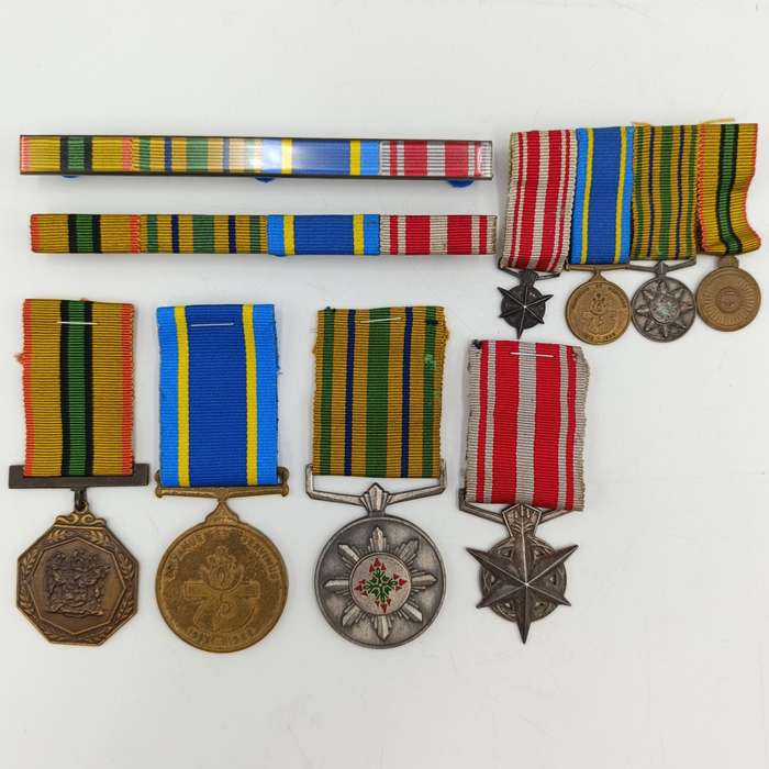 Set of 4 Police and Railway Police medals issued to Captain JJ van der Merwe - plus miniature set