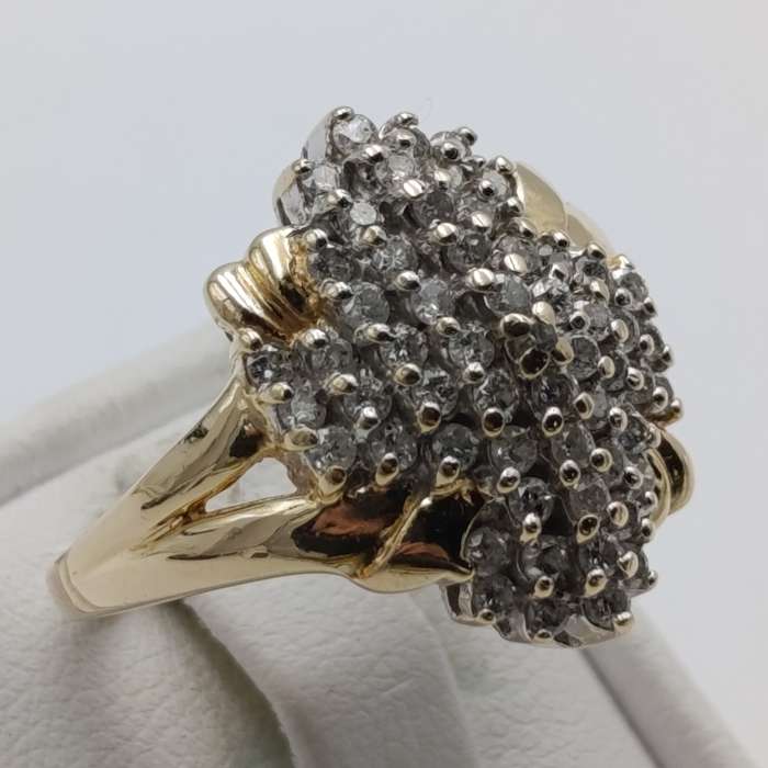14kt gold ring with 57 diamonds weight 6.3g