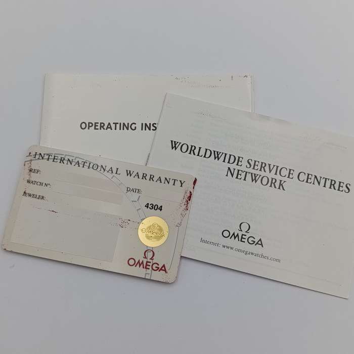 Omega 1530 Quartz 18kt gold men's watch - excellent condition in box with paperwork
