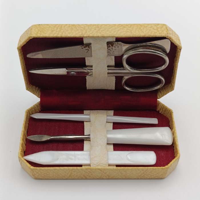 Vintage nail care kit in radio shaped case