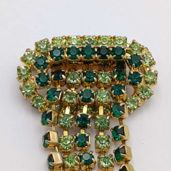 Vintage gold color & green stone brooch