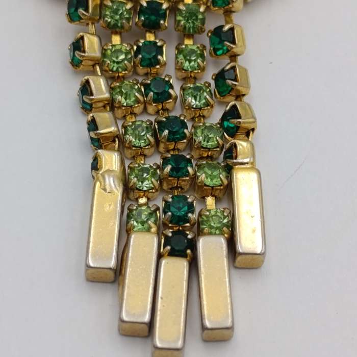 Vintage gold color & green stone brooch