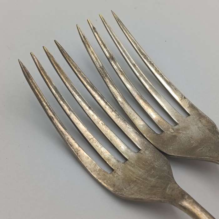 Vintage set of 8 Pak-Alam silverplated forks
