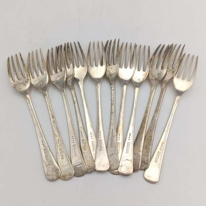 Vintage set of 12 Pak-Alam silverplated forks