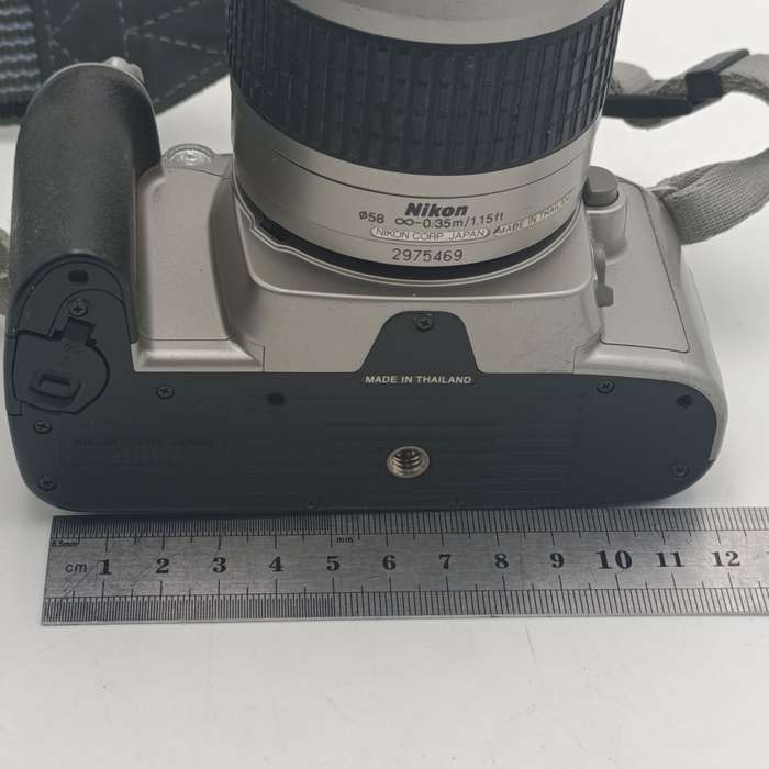 Nikon F22 camera with 28-80mm 1:3.3-56 lens in camera bag