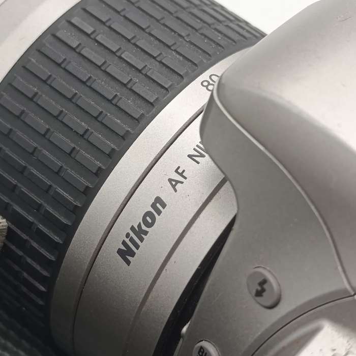 Nikon F22 camera with 28-80mm 1:3.3-56 lens in camera bag