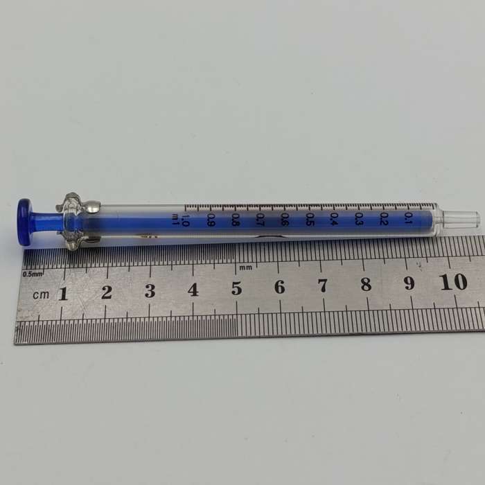 Lot of 7 vintage glass syringes