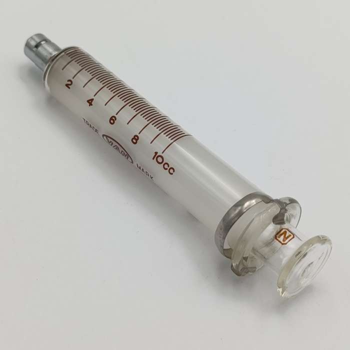 Lot of 7 vintage glass syringes