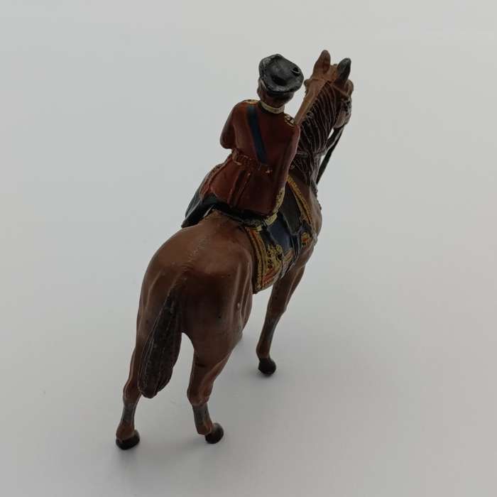 Queen Elizabeth II on horse figurine
